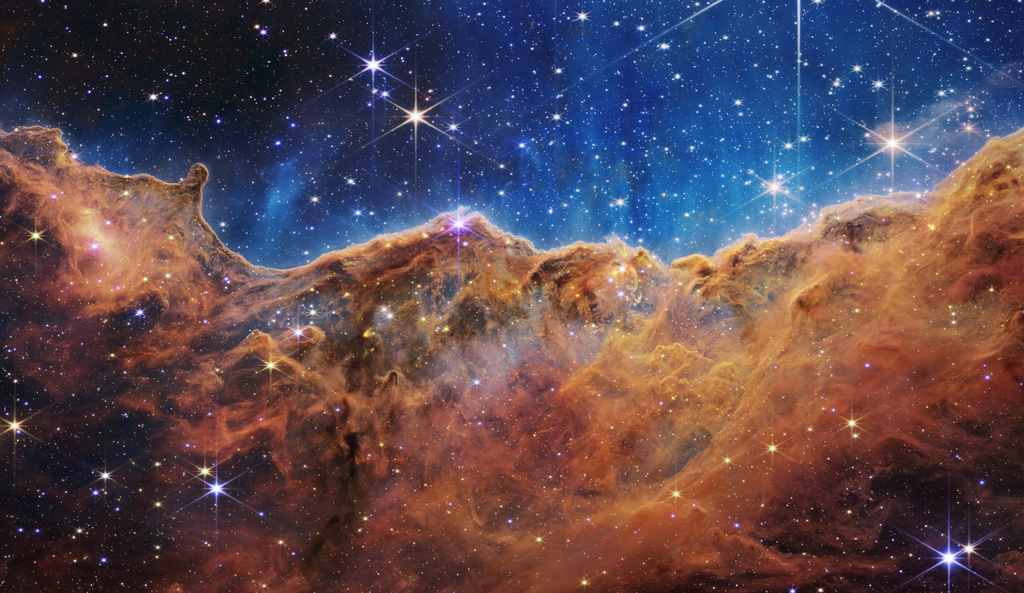 James Webb Telescope Capture of the Carina Nebula, gaseous clouds resembling mountain peaks