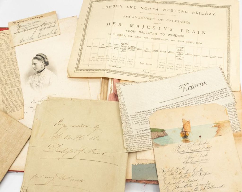a stack of aged letters from Queen Victoria featuring textspeak